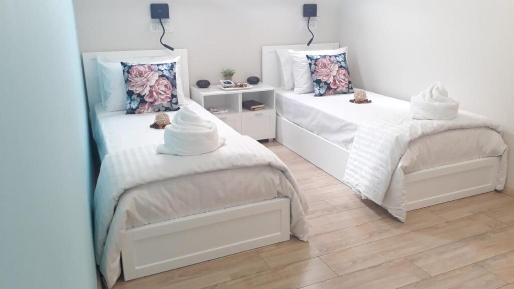 House with three single beds